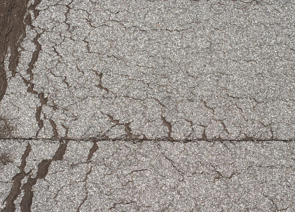 Daklekkage door scheuren in plat dak S-Heerenberg Losliggend dakleer op plat dak in S-Heerenberg